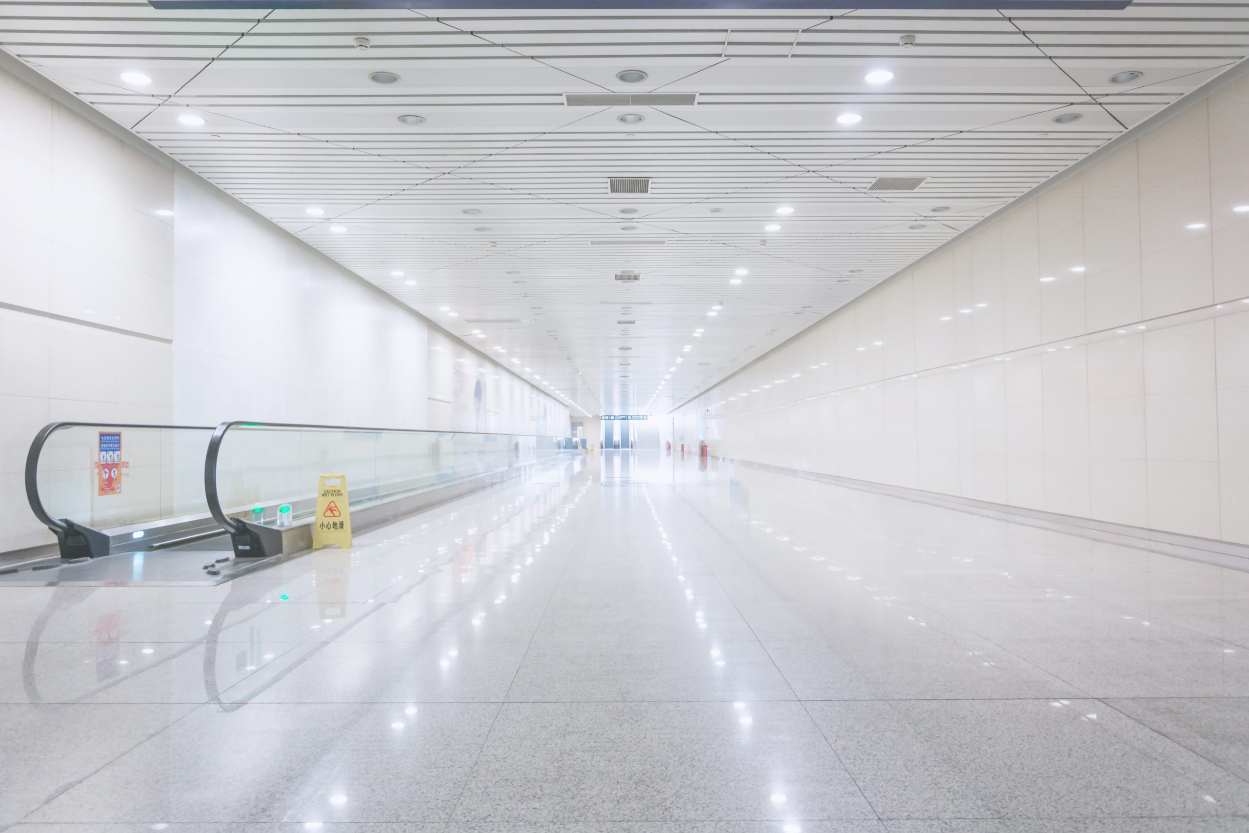 wide-hallway-with-moving-walkway-scaled-1.jpg